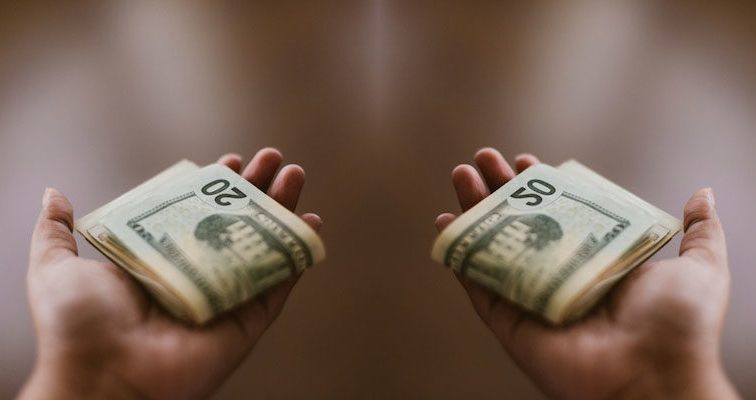 Where does a Christian take money to the church?
