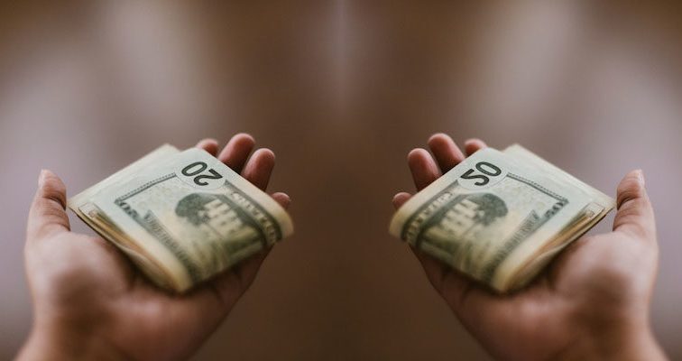 Where does a Christian take money to the church?